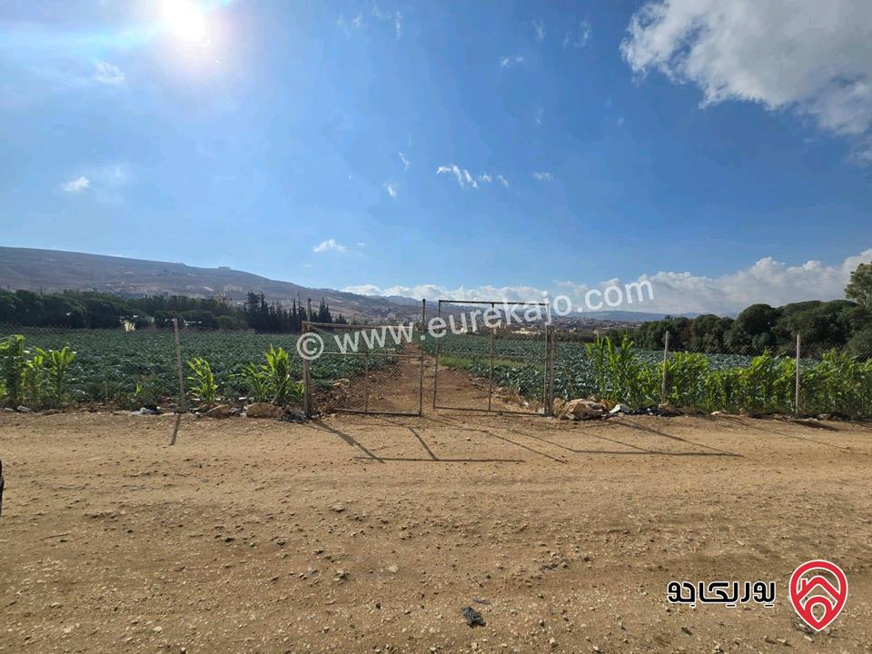 قطعة ارض ومشروع استثماري ناجح مساحة 24 دونم و 309م للبيع من اراضي شمال عمان - موبص تبعد عن شارع الاردن موقع قصر الجبل دقيقتين حوض سنينة الماء  