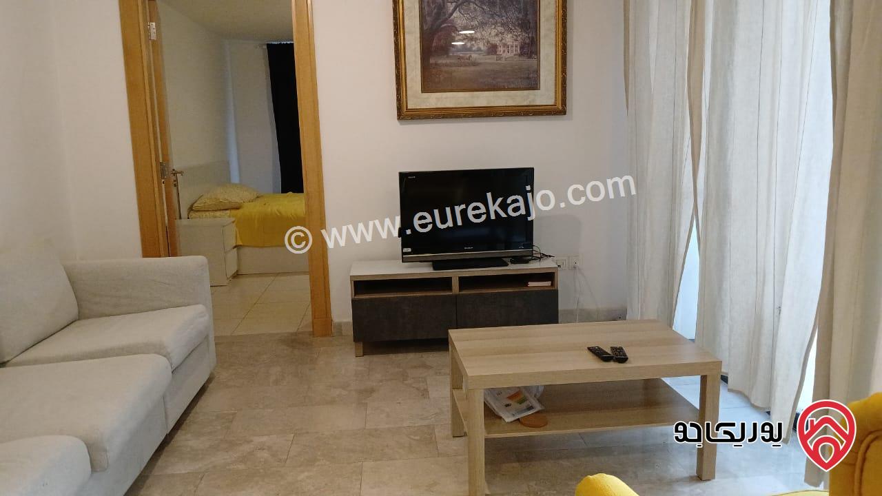 شقة مساحة 60م طابق اول للبيع مفروشة في عمان - ابراج داماك مطله على العبدلي مول