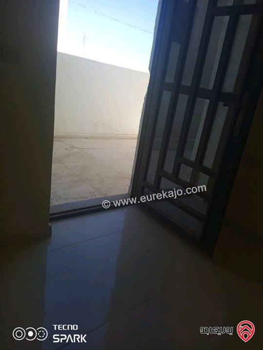 شقة مساحة 100م شبه ارضي للبيع في الزرقاء - مدينة الشرق