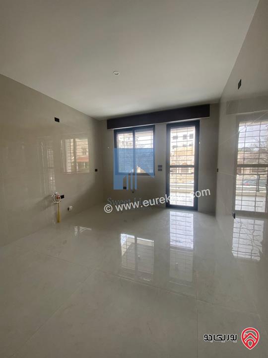 شقة أرضية 175م مع ترس امامي 25م للبيع في عمان - الرابية