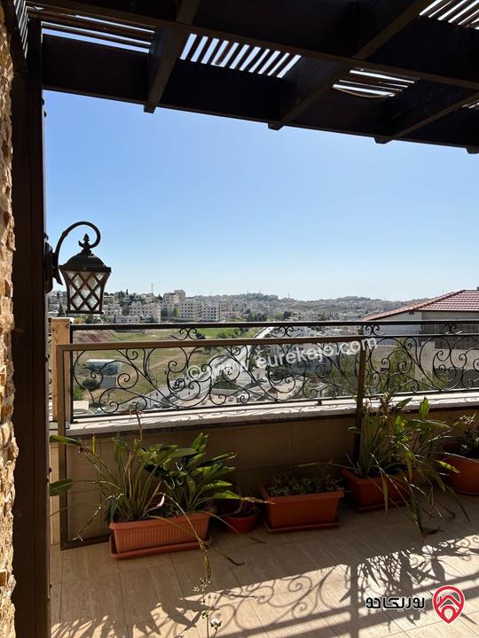 شقة طابق أخير مع روف مساحة 280م باطلالة خلابة للبيع في عمان - ضاحية النخيل من المالك مباشرة 