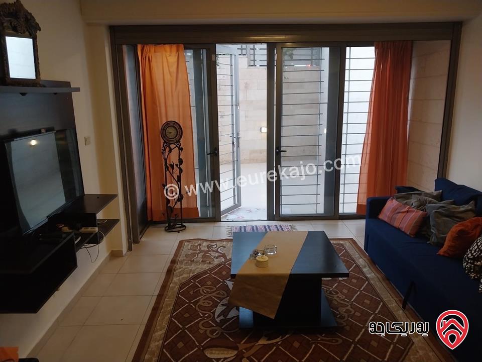 شقه للايجار في عمان - الدوار السابع مساحة 80م + 130م شبه ارضي قرب الترخيص