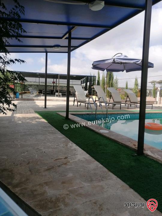 مزرعة ومنتجع مساحة الأرض 3 دونم و 700م والبناء 250م للبيع في اربد - كفر سوم قوشان مستقل استثمارية وسكنية