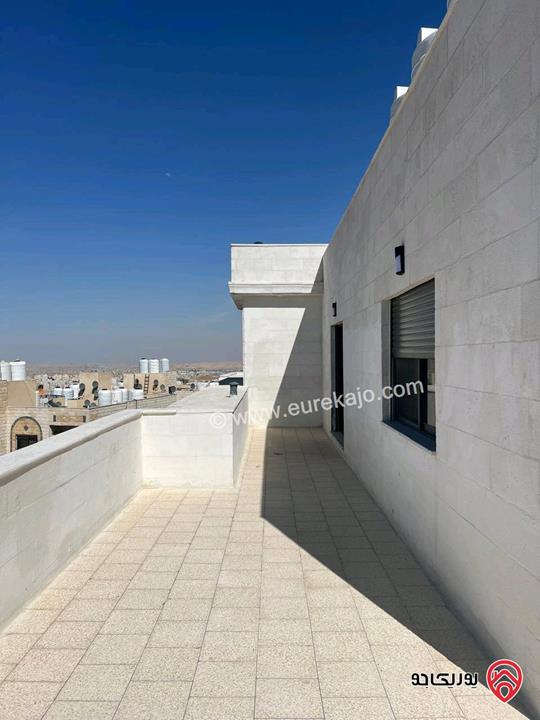 شقة طابق أخير مع روف مساحة 190م للبيع في عمان - طبربور بالقرب من دوار الدبابه