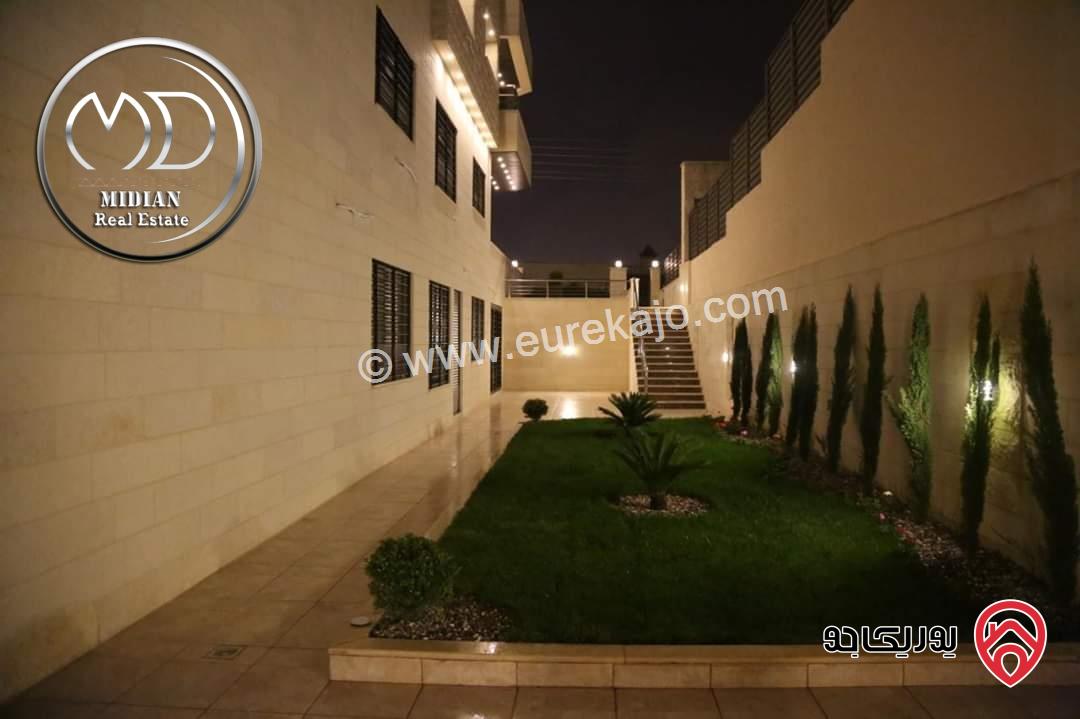 شقة شبه ارضي فارغة للايجار في عمان - ضاحية النخيل مساحة 200م مع ترس و حديقة 250م تشطيبات ديكورات عصرية فاخرة