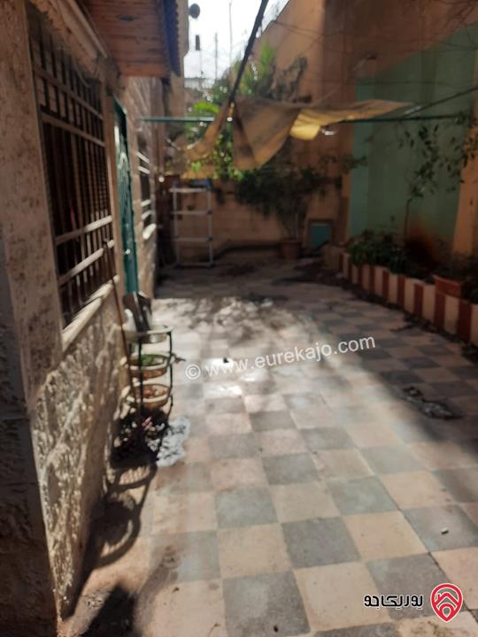 شقة مساحة 149م العمارة تقع على شارعين الشقة من الشارع الاول تسوية ثاني، ومن الشارع الخلفي طابق اول للبيع في عمان - طبربور – حي الخزنة 