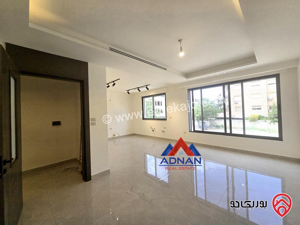 شقة ارضية مساحة 205م مع تراس و مدخل خاص ذو تشطيبات عالية للبيع في عمان - اجمل مواقع الرابية 