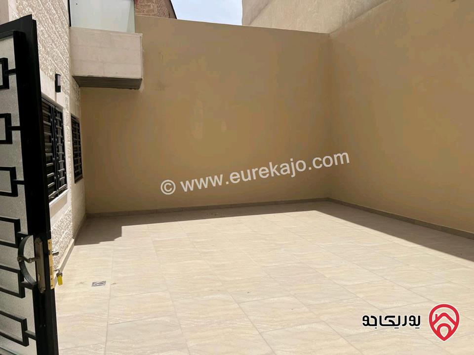 شقة ارضية مساحة 100م للبيع في عمان - طبربور