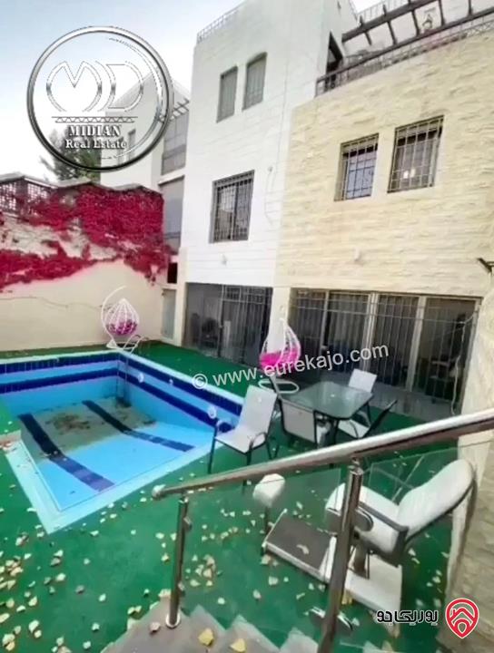 فيلا مفروشة فاخرة للايجار في عمان - دابوق مساحة 600م مع مسبح وتراسات وحدائق تشطيبات و ديكورات سوبر ديلوكس اطلالة جميلة