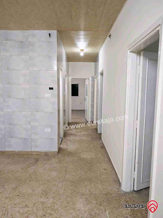 شقة طابق أول مساحة 87م للايجار في اربد غرب نفق الجامعة 