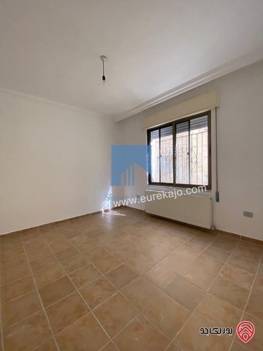 شقة أرضية مميزة  186م مع حديقة وترسات 150م للبيع في عمان - الجندويل