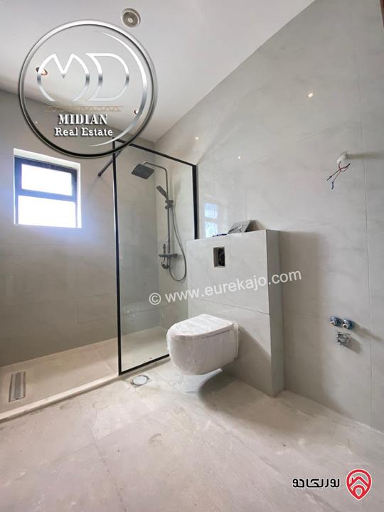 شقة ارضية جديدة للبيع في عمان - تلاع العلي مساحة 210م مع ترس و حديقة 140م تشطيبات ديكورات عصرية فاخرة بسعر مميز