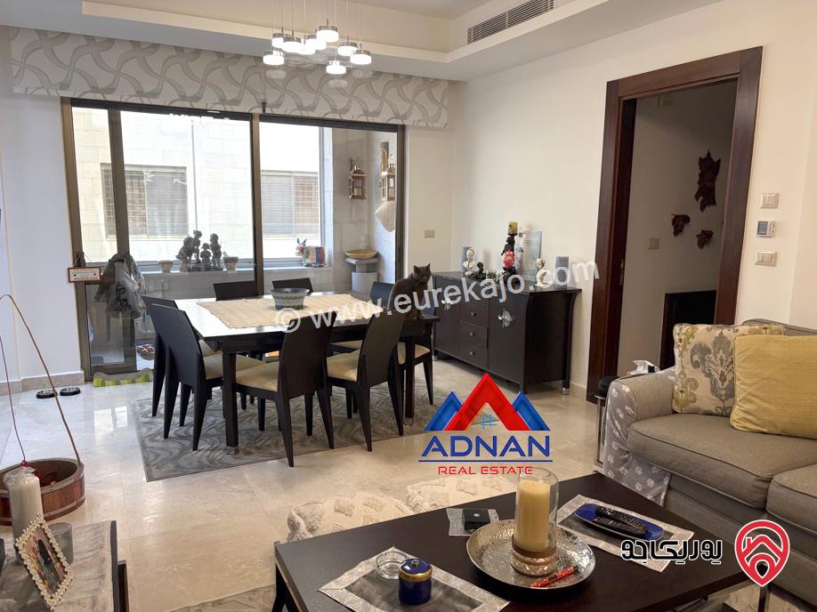 شقة ارضية مميزة مساحة 210م داخلي مع تراس 60م ومدخل و كراج خاص للبيع في عمان - عبدون