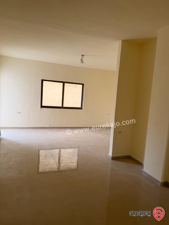 شقة طابق أول مساحة 128م للبيع في عمان - الجبل الأخضر حي نزال الشمالي 