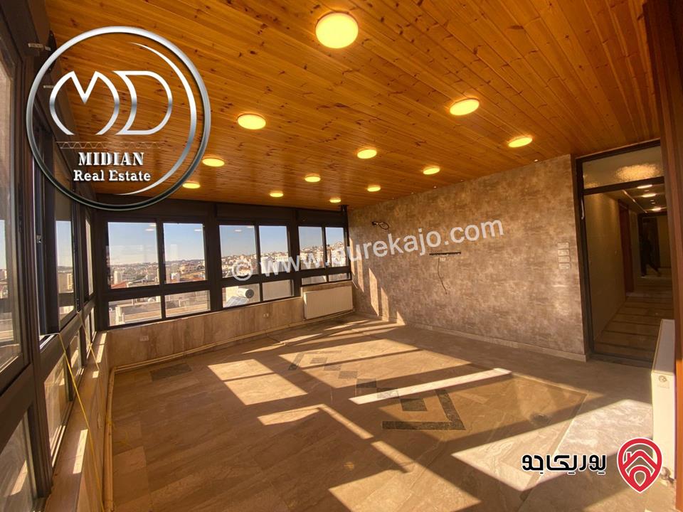 شقة للايجار طابق أخير مع روف في عمان - خلدا - العوجانية مساحة 425م مع تراسات تشطيبات ديكورات فاخرة اطلالة بانورامية خلابة