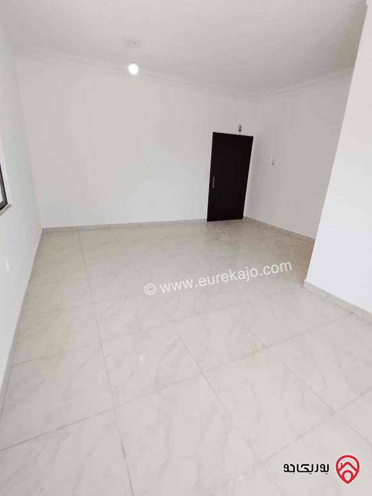 شقة طابق أول مساحة 100م للبيع في العقبة بسعر مميز 