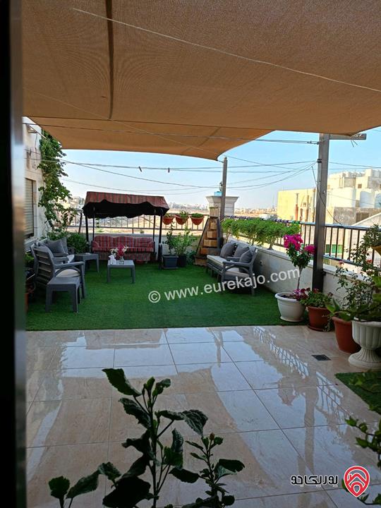 شقة طابق أخير مع روف مساحة 320م للبيع في عمان - مرج الحمام