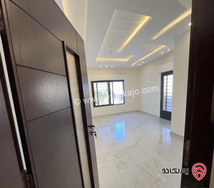 شقة طابق ارضي معلق مساحة 150م مع ترس 40م للايجار في عمان - البنيات 