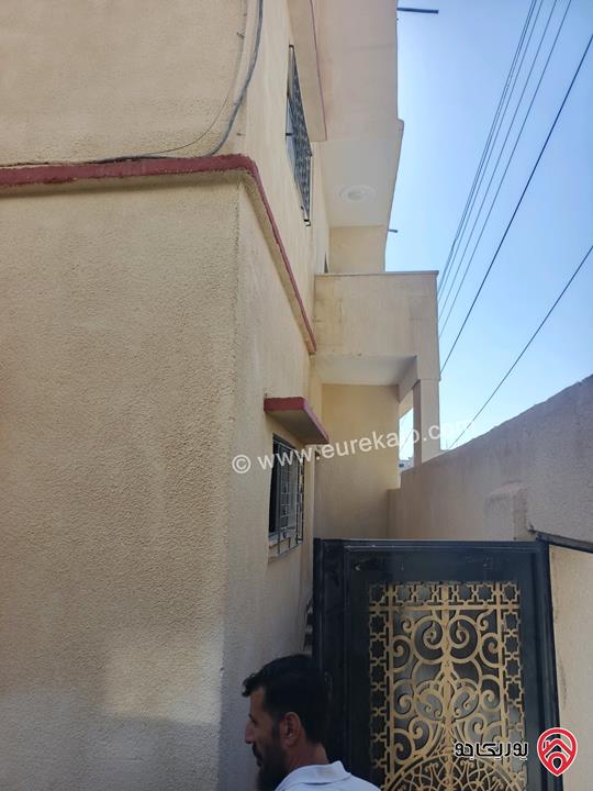 بناية سكنية على أرض 567م للبيع في الزرقاء - حي معصوم