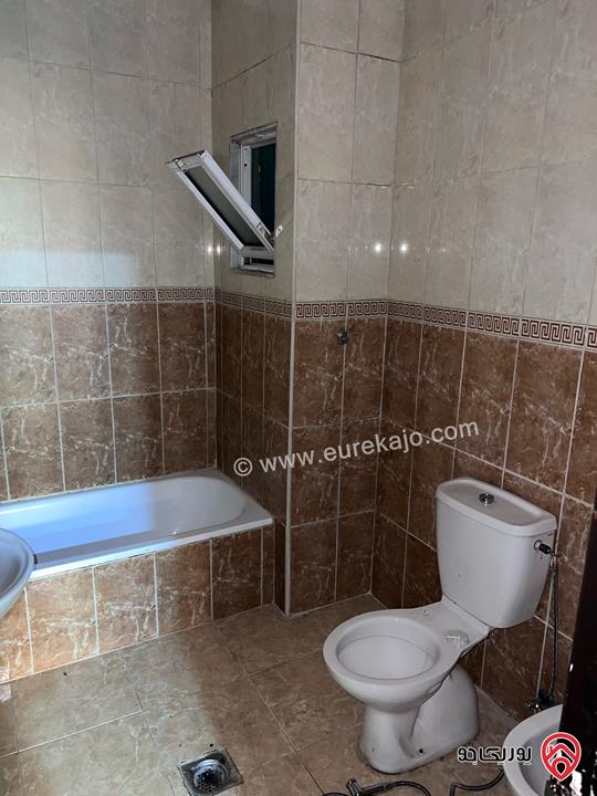 شقة شبه أرضية مساحة 100م داخلي و 100م خارجي للبيع في عمان - الجبيهة 