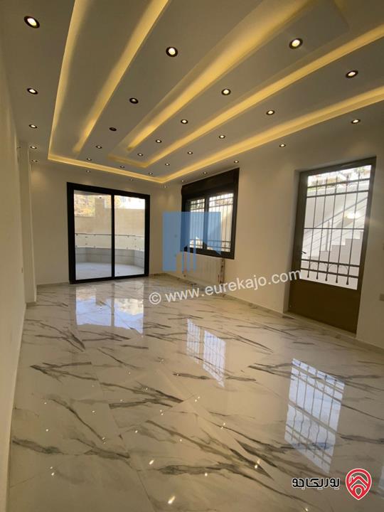 شقة فاخرة شبه أرضية مساحة 160م مع ترس 25م تشطيب سوبر ديلوكس للبيع في عمان - تلاع العلي