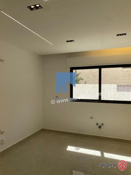 شقة أرضية فاخرة للبيع في عمان - أم أذينة قرب أبراج السادس 200م مع ترس 60م لم تسكن