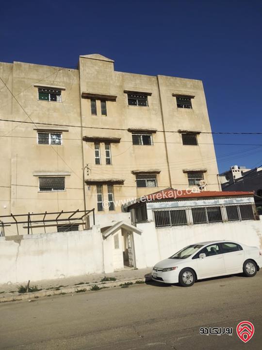 بناية سكنية مساحة الأرض 662م عليها 8 شقق عمر البناء 30 سنة للبيع في عمان - حوض مرج الحمام الوسطاني دخلة عميش موازية لسور شركة اورانج 