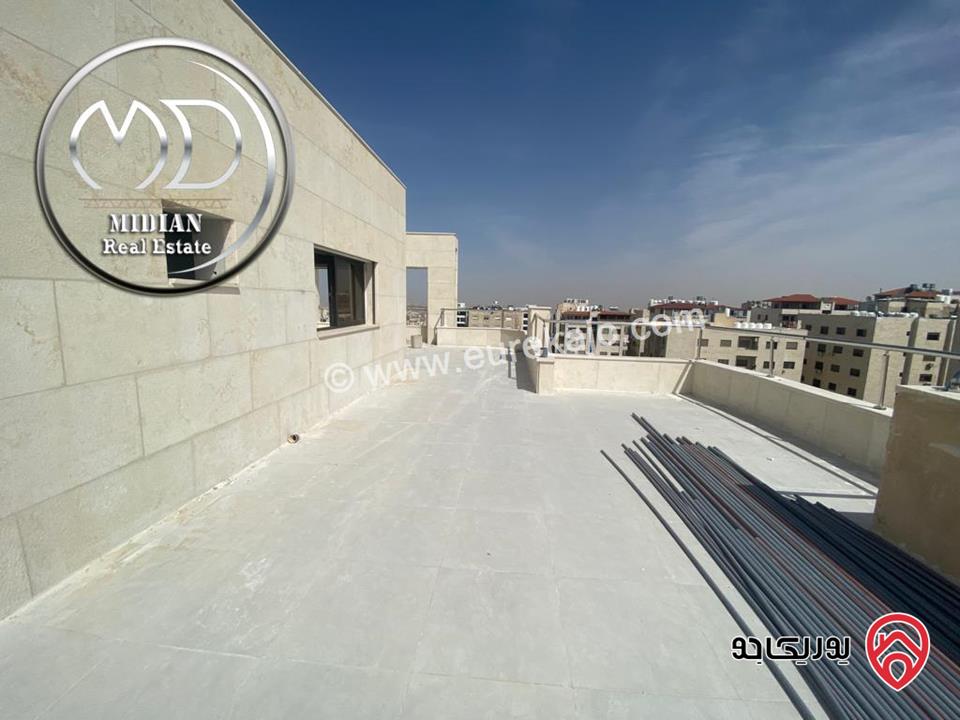 شقة دوبلكس جديدة للبيع طابق اخير مع روف في عمان - ضاحية الرشيد مساحة 215م مع تراسات اطلالة رائعة بسعر مميز جداً