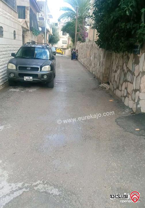 قطعة ارض 232م عليها طابقين بناء قديم كل طابق 100م للبيع في عمان - المدينة الرياضية