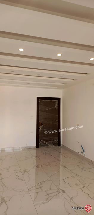 شقة جديدة طابق اول مساحة 150م للبيع في عمان - الجبيهة خلف حديقة الجبيهة