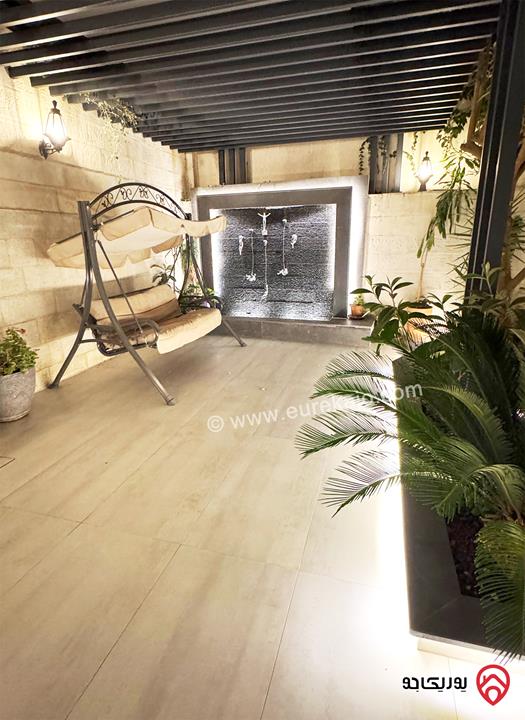 شقة شبه أرضية مساحة 135م داخلي مع حديقة 130م مفروشة بالكامل للايجار في عمان - عبدون