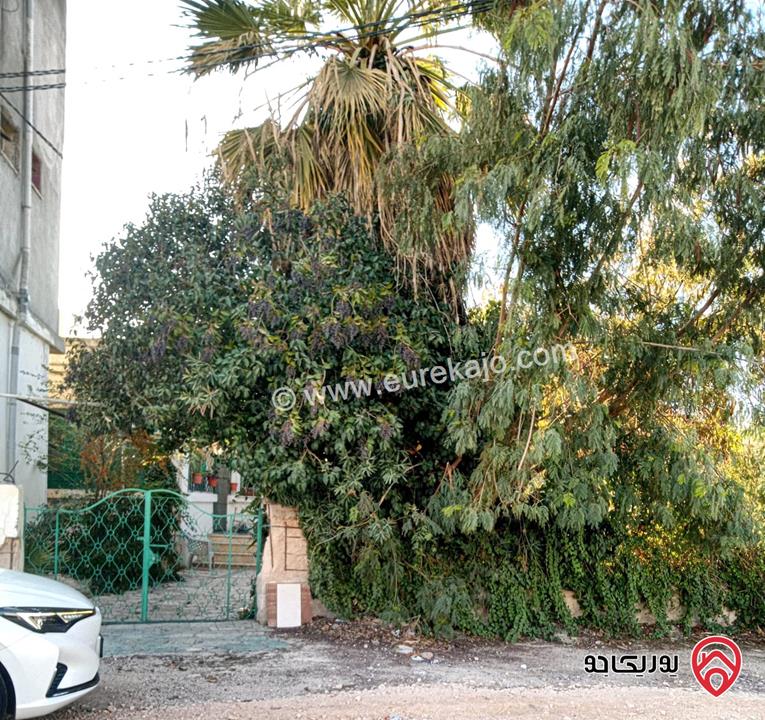 أرض مساحة 627م وبيت للبيع أو للإستثمار في إربد -قميم الشارع الرئيسي 