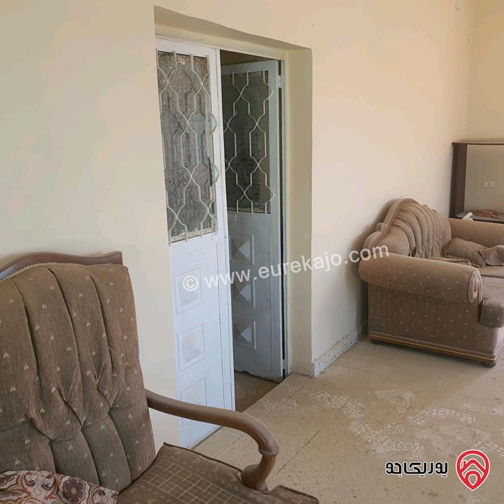 قطعة أرض مساحة 594م عليها بيت طابقين للبيع في البحر الميت جوفة الكفرين 