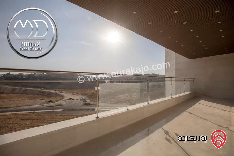 شقة دوبلكس جديدة طابق اخير مع روف مساحة 325م مع تراسات تشطيبات و ديكورات فاخرة اطلالة جميلة للبيع في عمان - دير غبار