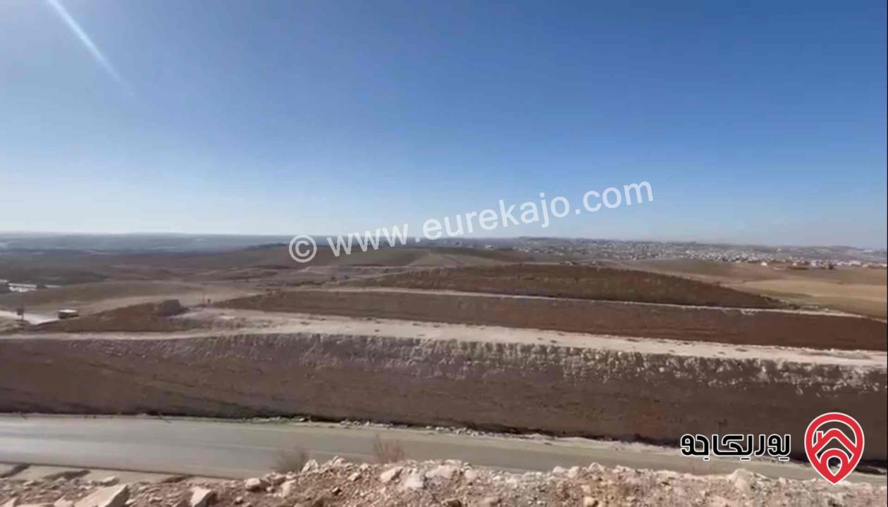 ارض استثمارية 14 دونم للبيع في عمان الجديدة على شارع المية التنموي مباشرة