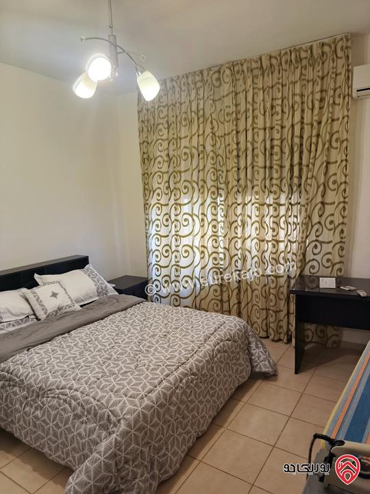 شقة طابق أرضي مساحة 173م مع ترس 60م مفروشة للبيع في عمان - الرابية