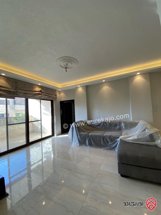 شقة طابق ثاني مساحة 195م للبيع في عمان - منطقة ام أذينة 