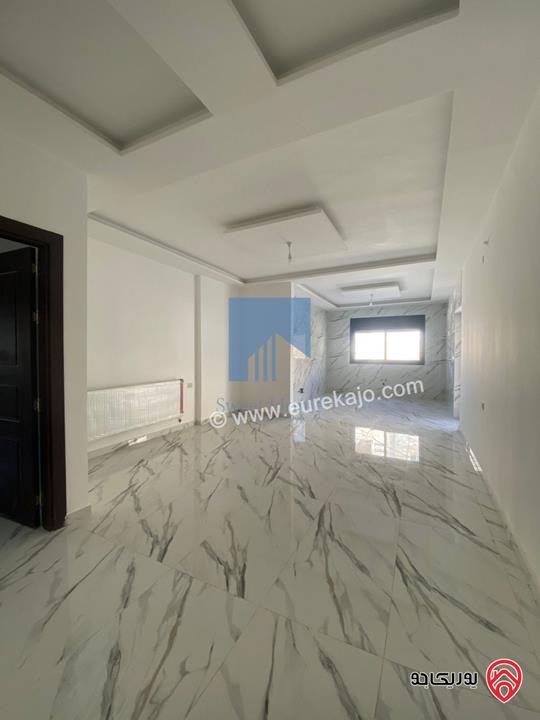 شقة فاخرة شبه أرضية مساحة 160م مع ترس 25م تشطيب سوبر ديلوكس للبيع في عمان - تلاع العلي