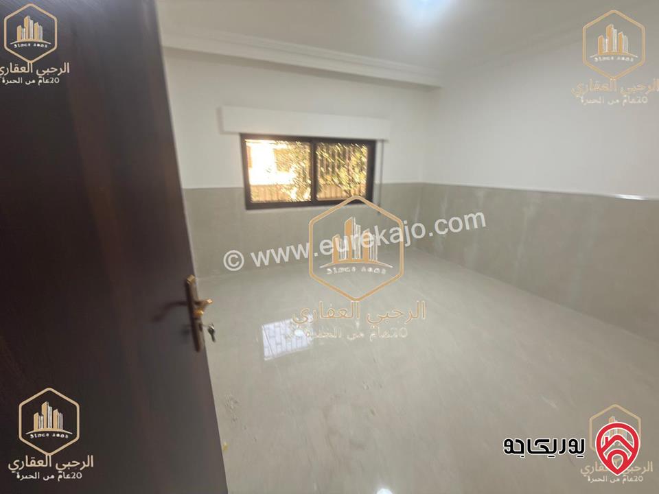 شقة فارغة طابق أرضي مساحة 110م داخلي و 30م خارجي للايجار في عمان - الرابية