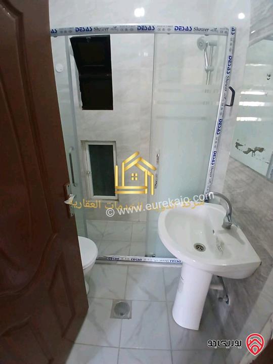 شقة فارغة طابق تسوية مساحة 130م داخلي و 40م خارجي للايجار في عمان - الرابية