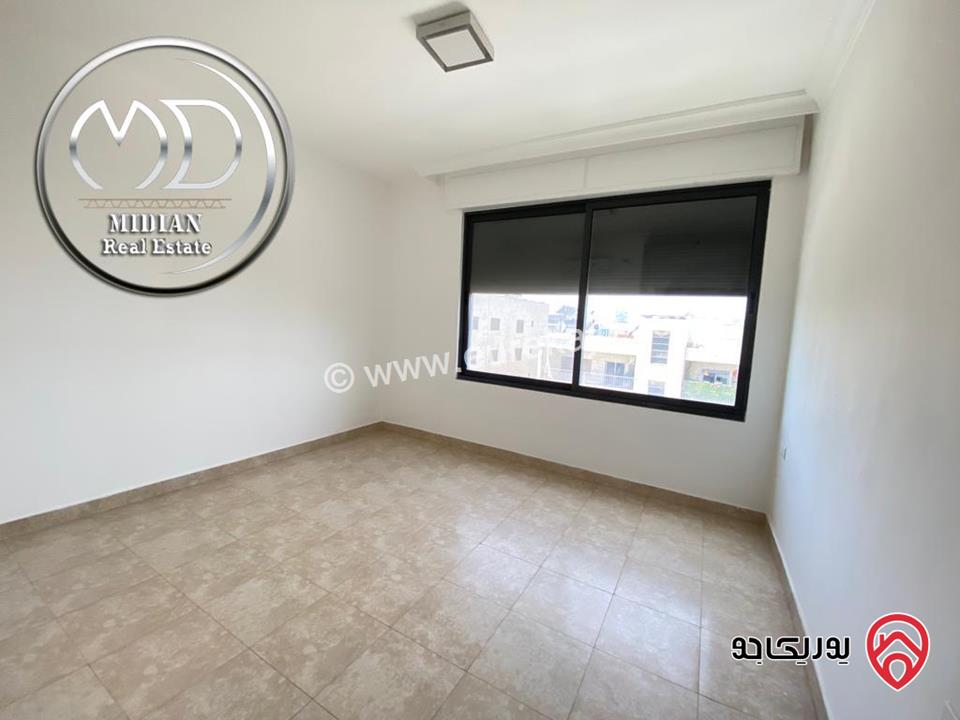 شقة ارضية فارغة للايجار في عمان - ام اذينة مساحة 150م مع ترس و حديقة 200م تشطيبات و ديكورات سوبر ديلوكس