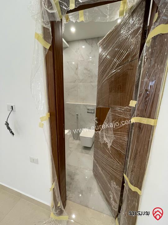 شقة طابق اول جديدة مساحة 100م لم تسكن للايجار في عمان - عبدون