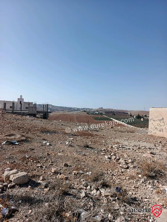 قطعتين أرض مساحتهم معاً 500م للبيع في مادبا - تطوير ماعين ع شارعين بسعر مناسب 35 الف