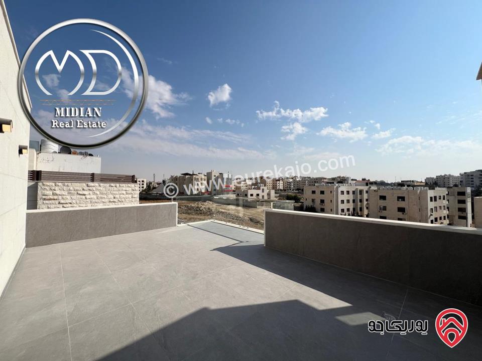 شقة دوبلكس جديدة طابق أخبر مع روف للبيع في عمان - حي الصحابة مساحة 215م مع تراسات اطلالة رائعة بسعر مميز