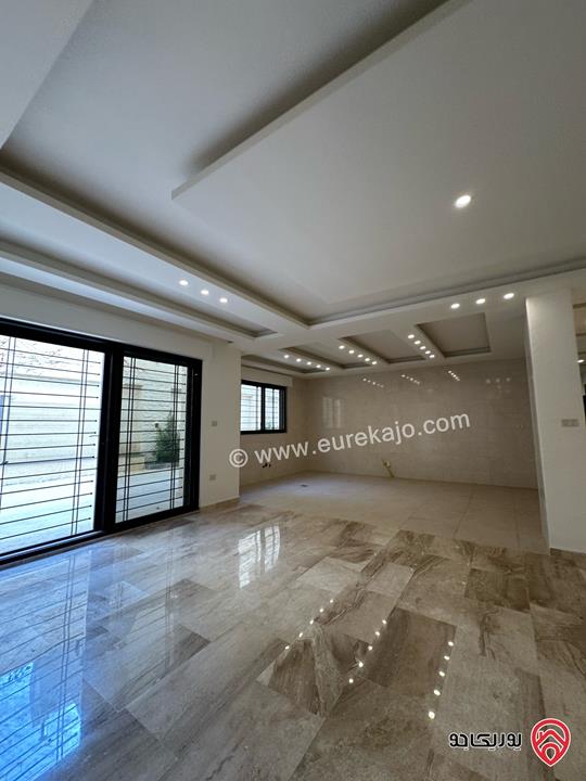 شقة مميزة ارضية مساحة 250م داخلي مع حديقة 250م للبيع في عمان - ضاحية النخيل 