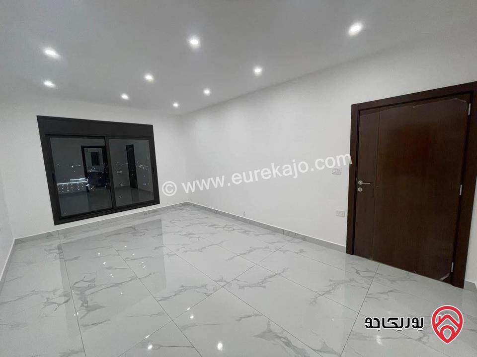 شقة فاخرة جديدة ارضية مساحة 188م داخلي و 90م خارجي للبيع في عمان - الجبيهة