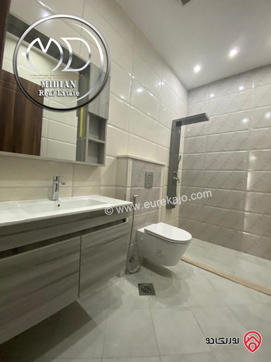 شقق أرضية جديدة للبيع في عمان - خلدا مساحات 165م & 170م مع تراسات و حدائق تشطيبات ديكورات سوبر ديلوكس بأسعار مميزة