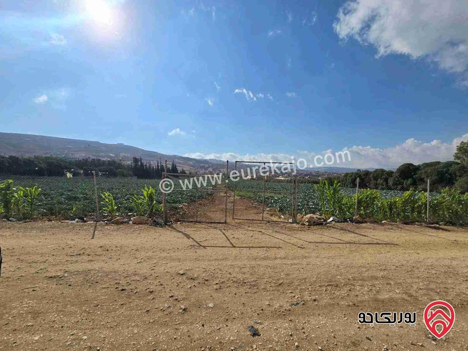 قطعة ارض ومشروع استثماري ناجح مساحة 24 دونم و 309م للبيع من اراضي شمال عمان - موبص تبعد عن شارع الاردن موقع قصر الجبل دقيقتين حوض سنينة الماء  