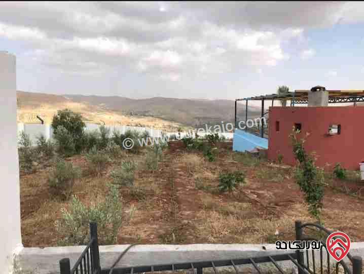 مزرعة مميزة مساحة الأرض 3400م ومساحة البناء 100م للبيع في عنيبة طريق جرش الزرقاء 