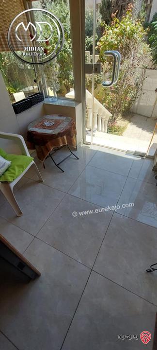 شقة ارضية مفروشة للايجار في عمان - الجاردنز مساحة 180م مع ترس و حديقة 200م تشطيبات و فرش سوبر ديلوكس